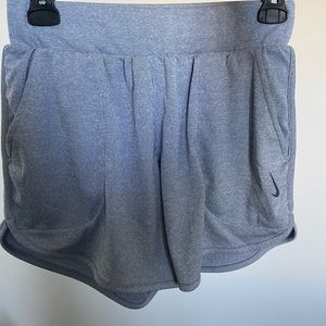 NIKE WOMEN’S YOGA RIBBED SHORTS BLUE